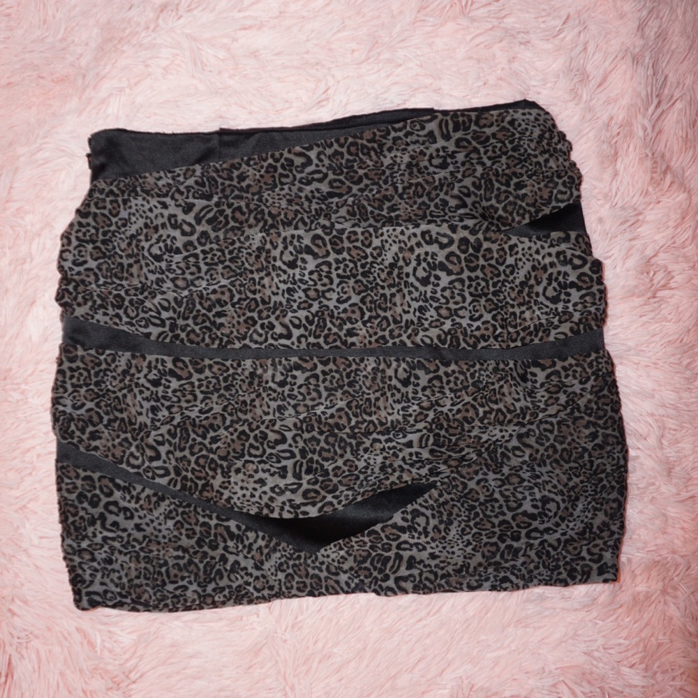 Bebe Leopard Print Mini Skirt
